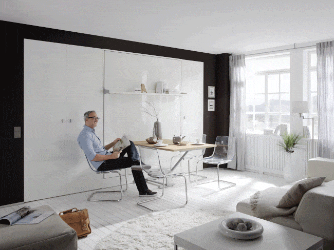 Op deze wijze klapt de bedkast Space met tafel uit tot bed en weer terug