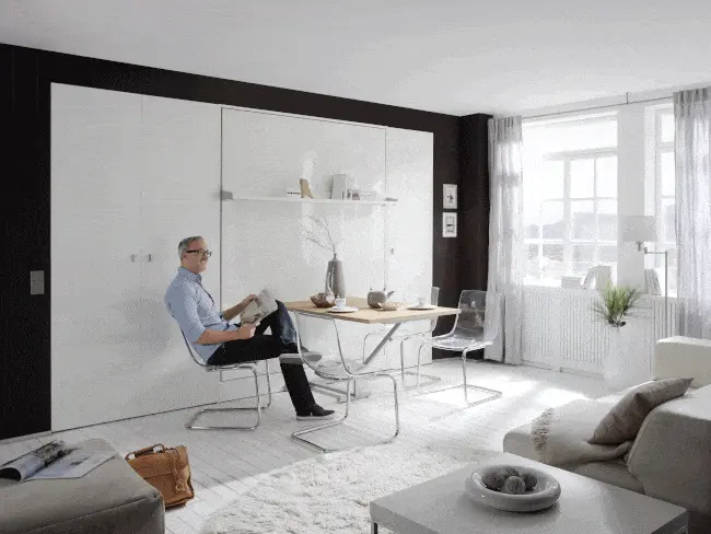 In this way, the Space bedside cabinet with table folds out into a bed and back again
